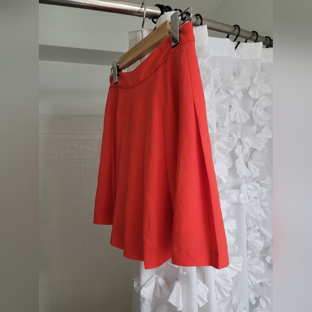 the pleated skirt